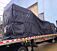 Airbag _ Parachute Fabric Ultra Light Lumber Tarp 24'x27' (8 ft Drop) Black On Trailer Side Angle View-Mytee Products. Airbag _ Parachute Fabric Ultra Light Lumber Tarp 24'x27' (8 ft Drop) Black On Trailer Side Angle View-Mytee Products.