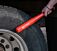aluminum_tire_checker_bat_with_strap_and_anti-slip_grip_action_shot